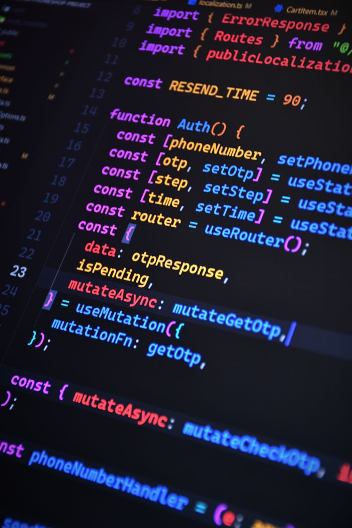 Crafting Captivating Headlines: Your awesome post title goes here Close-up of vibrant JavaScript code for web development with ReactJS and Tailwind CSS.